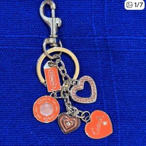 Orange and silver keychain. Not authentic